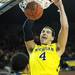 Michigan freshman Mitch McGary dunks the ball during the second half against North Carolina State at Crisler Center on Tuesday night. Melanie Maxwell I AnnArbor.com